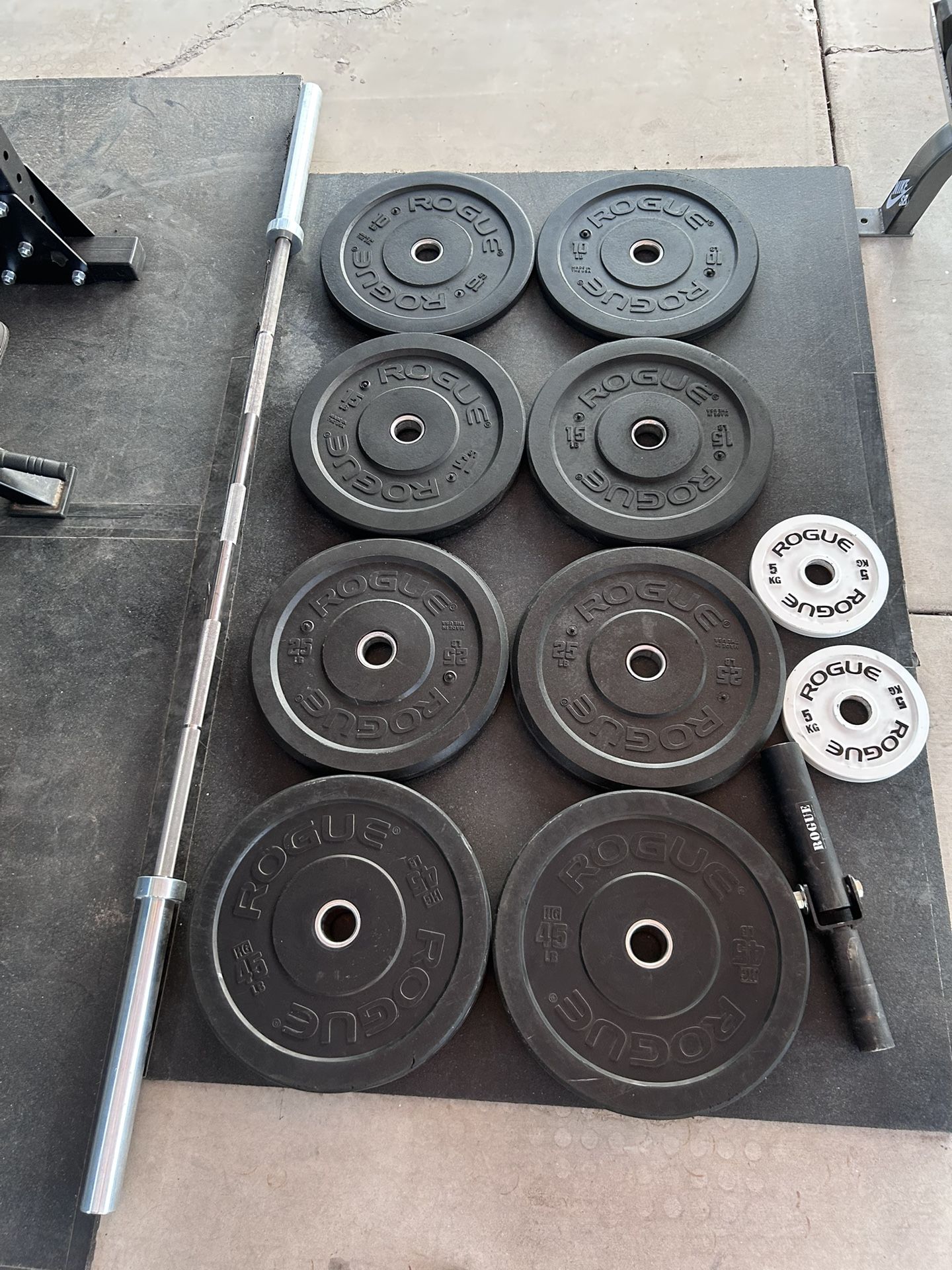 Rogue bumper plates with boneyard barbell
