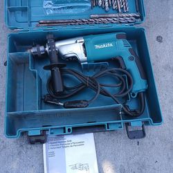 Makita hammer drill powered