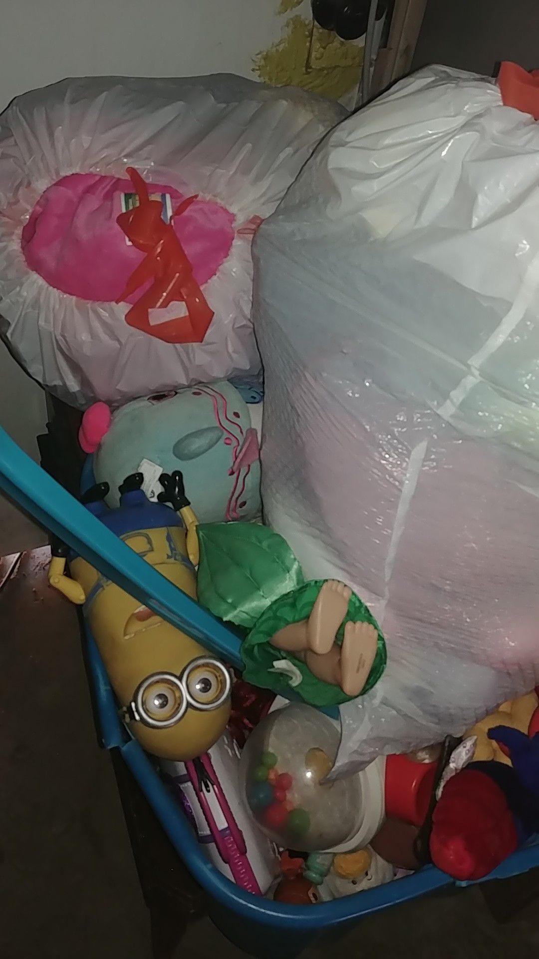 Stuffed animals and box of toys