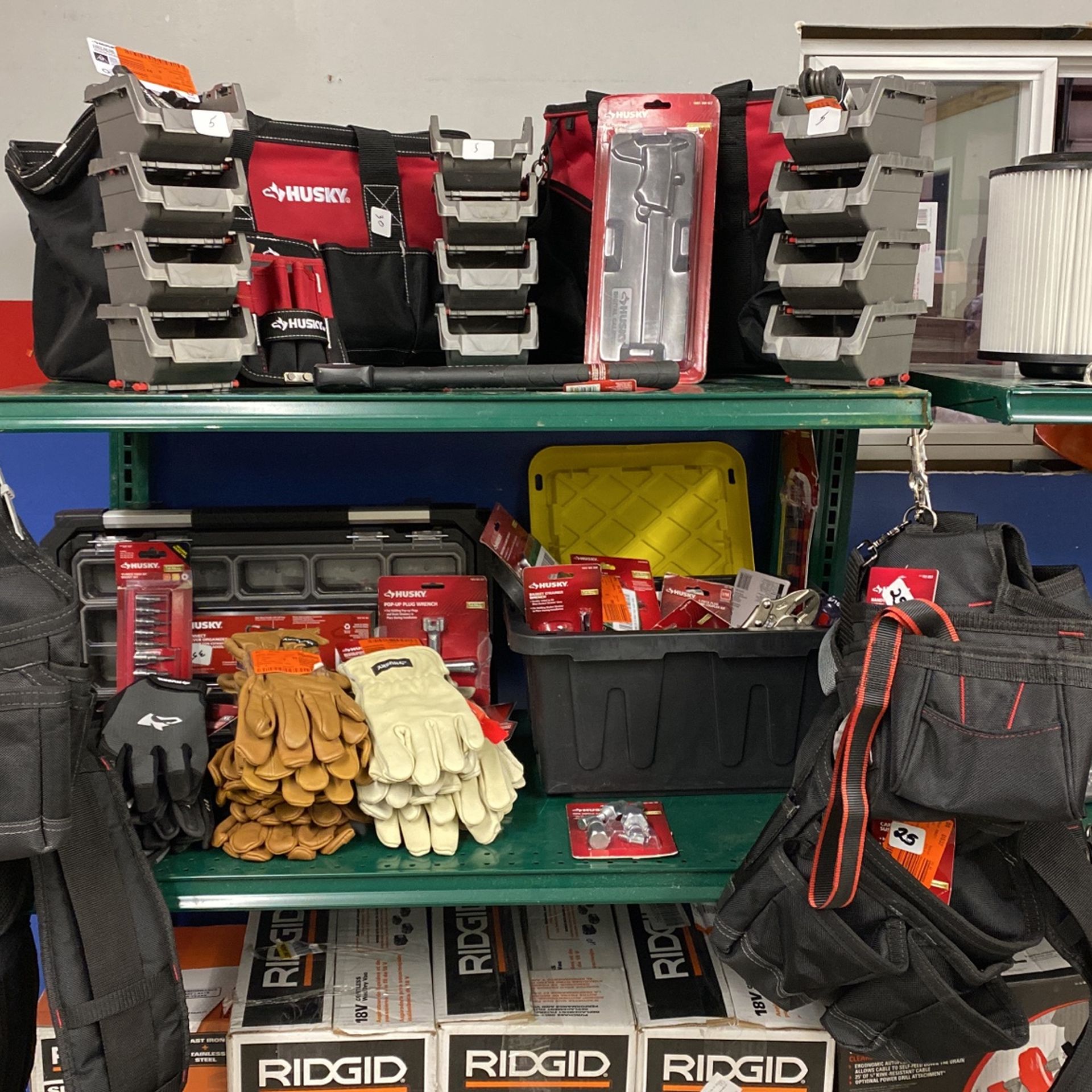Assorted husky tool bags tool belts storage toolboxes gloves and assorted tools prices vary must come in store
