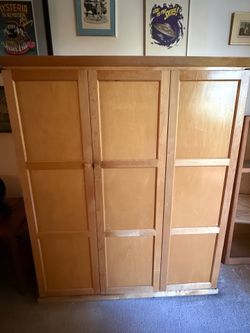 Beautiful solid wood computer armoire/home office workstation in excellent condition.