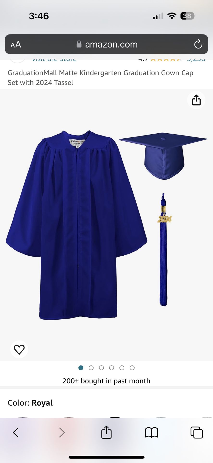 Child blue graduation cap, gown, and tassel set. Tassel includes removable charms for 2023 and 2024.