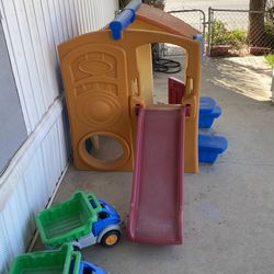 Kids Outside Playhouses 