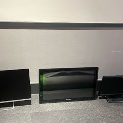 Three computer/computer screens 