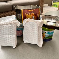 Pokémon Tin Mystery Bundle with Hits!