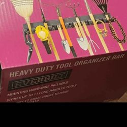 New Everbuilt heavy duty tool organizer bar...stores 11 long handled tools & 12 hooks for smaller items...36 inches long...buy it for $16.00

