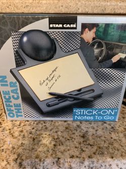 Stick-On" Notes to Go car organizer with a notepad and pen.