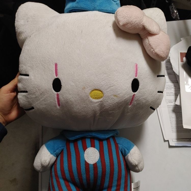 Hello kitty clown plush sales