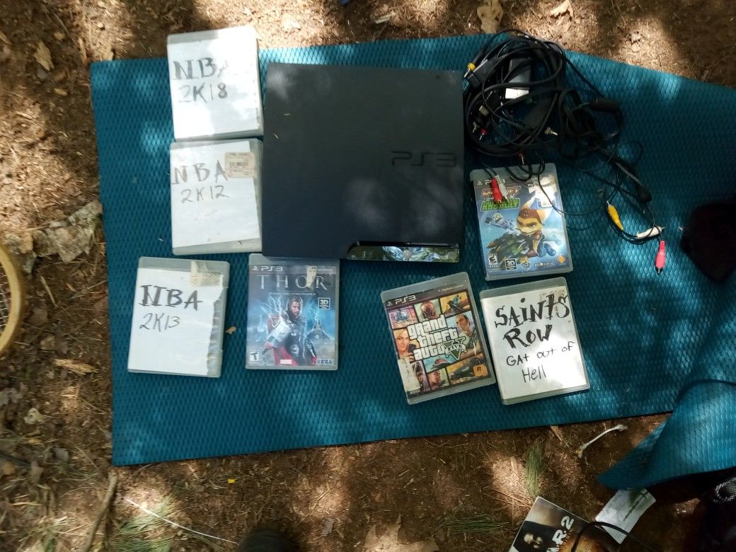 PlayStation 3 With Six Games NBA 2k18 NBA 2K12 NBA 2K13 Thor God Of Thunder Grand Theft Auto V Saints Row Got Out Of Hell And Ratchet Clank Full Front