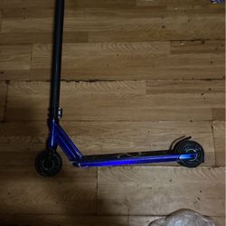 2 Pro Scooters On Is Really Old The Other Was Is Slightly Old