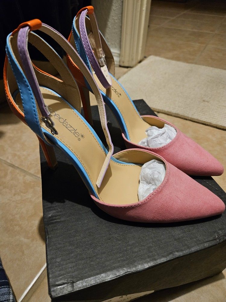 New in Box Pink Carnation Multi Color Sling Back Heels. Size 6.5 Heel 3.75-4 Inches.  Must Pick Up In Horizon. Offers Accepted 