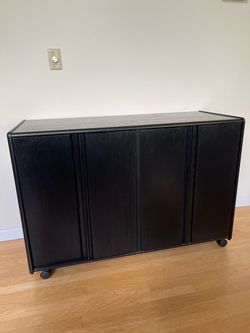 Versatile wood cabinet