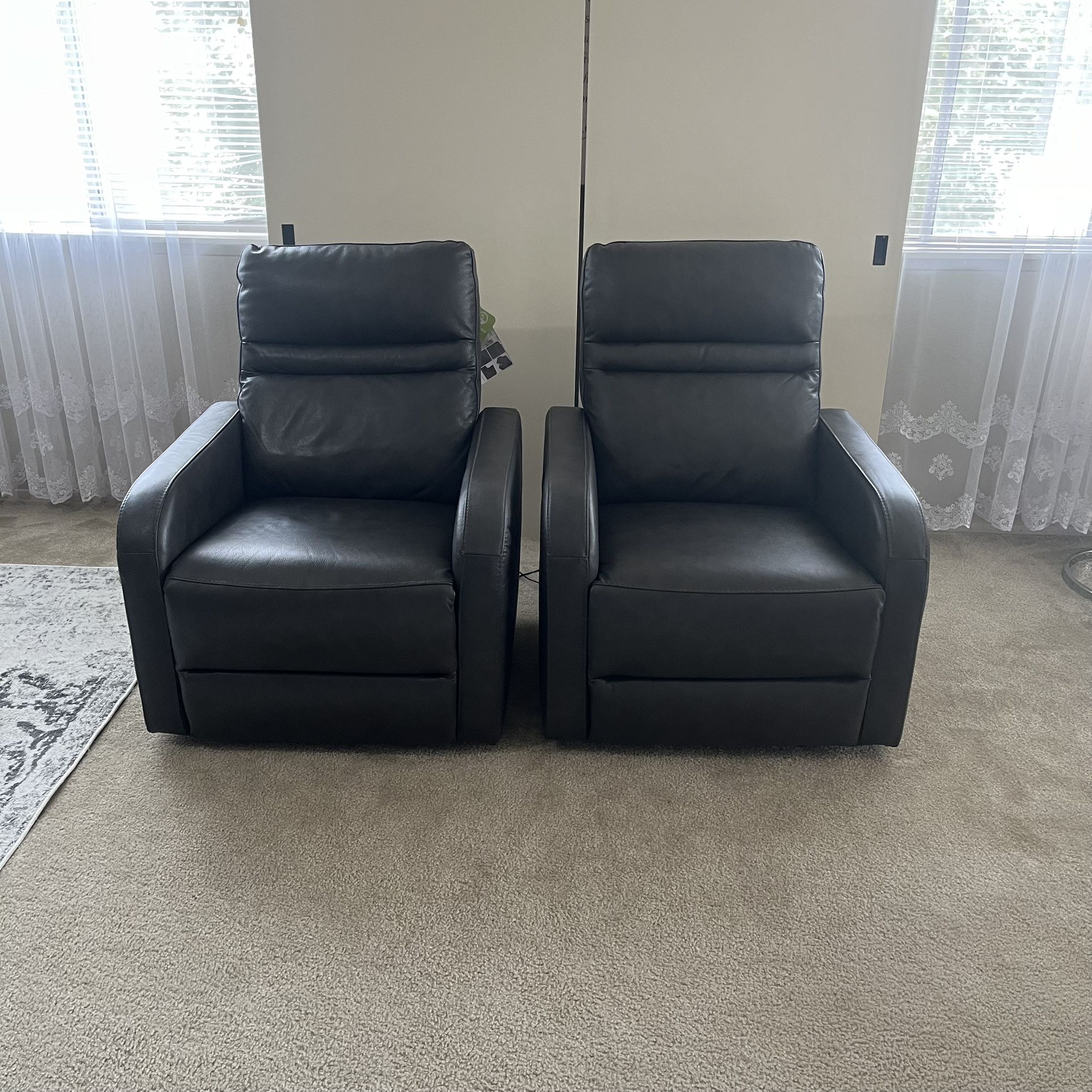 Set of 2 Very soft Aldryn Power Glider Recliner Chairs made with Top Grain Leather.