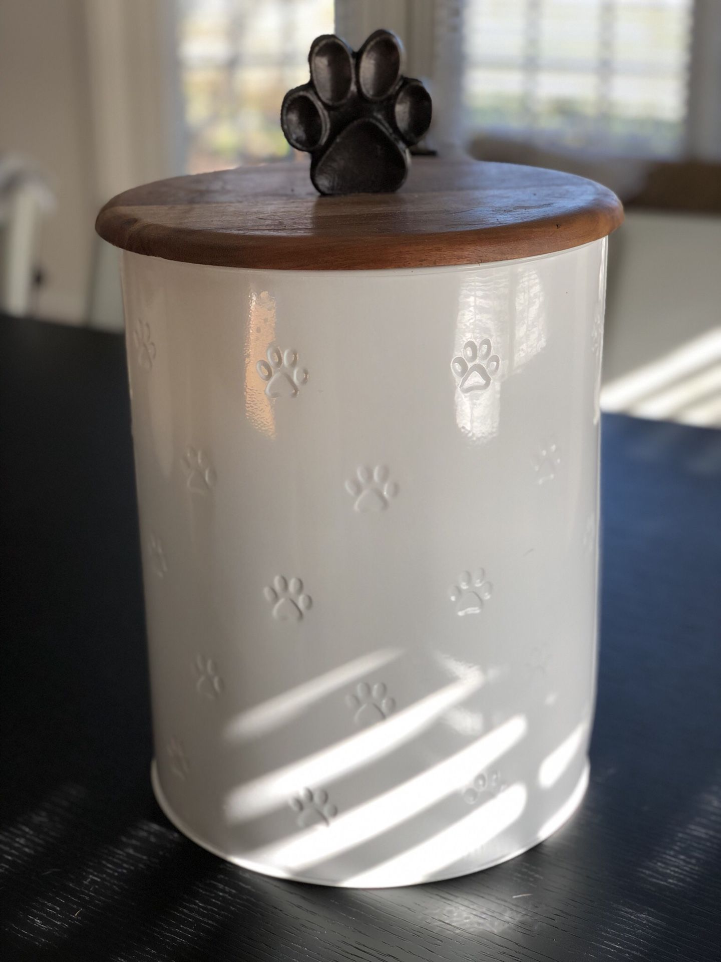 White metal with wood top and metal paw dog food container 11 inch circumference and 13 inches high last photo show New interior