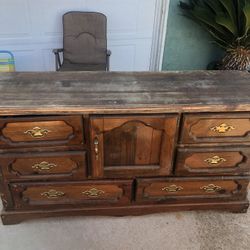 Wooden Dresser With Multiple Drawers 