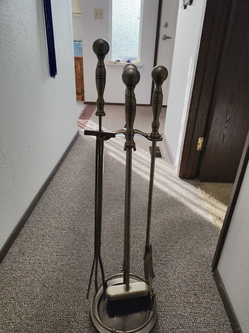 Fireplace Tool Set. Very Very Heavy. This Is A Little Talker Than The Other One We Posted.Ring Popped Out While Cleaning But Does Not Affect Anything