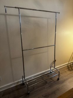 Brand new double garment rack (expandable)