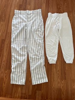 2 Pair Of Baseball Pants.  Striped Is Adult Large.  White Is Youth Large.   Both For $10.   New