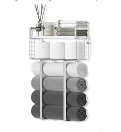 New wall-mounted towel rack is constructed from silver-toned metal.