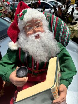 Animated Santa with chair and lamp