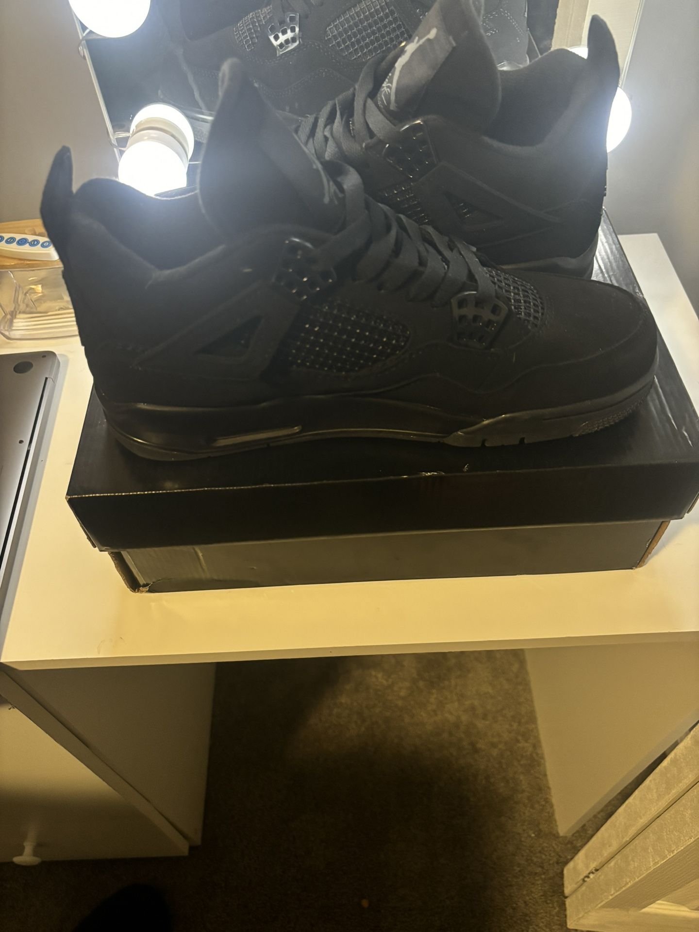 Black Cat Jordan 4s 