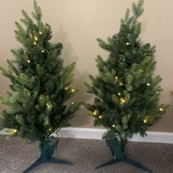 Twin pre-lit Christmas trees