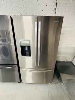 Whirlpool stainless steel refrigerator (36" x 69" x 29") with a receipt for a 90-day warranty