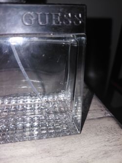 empty bottle of gusse colonge