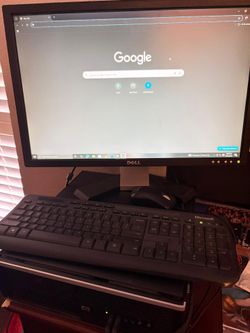 Comptadora, monitor y teclado