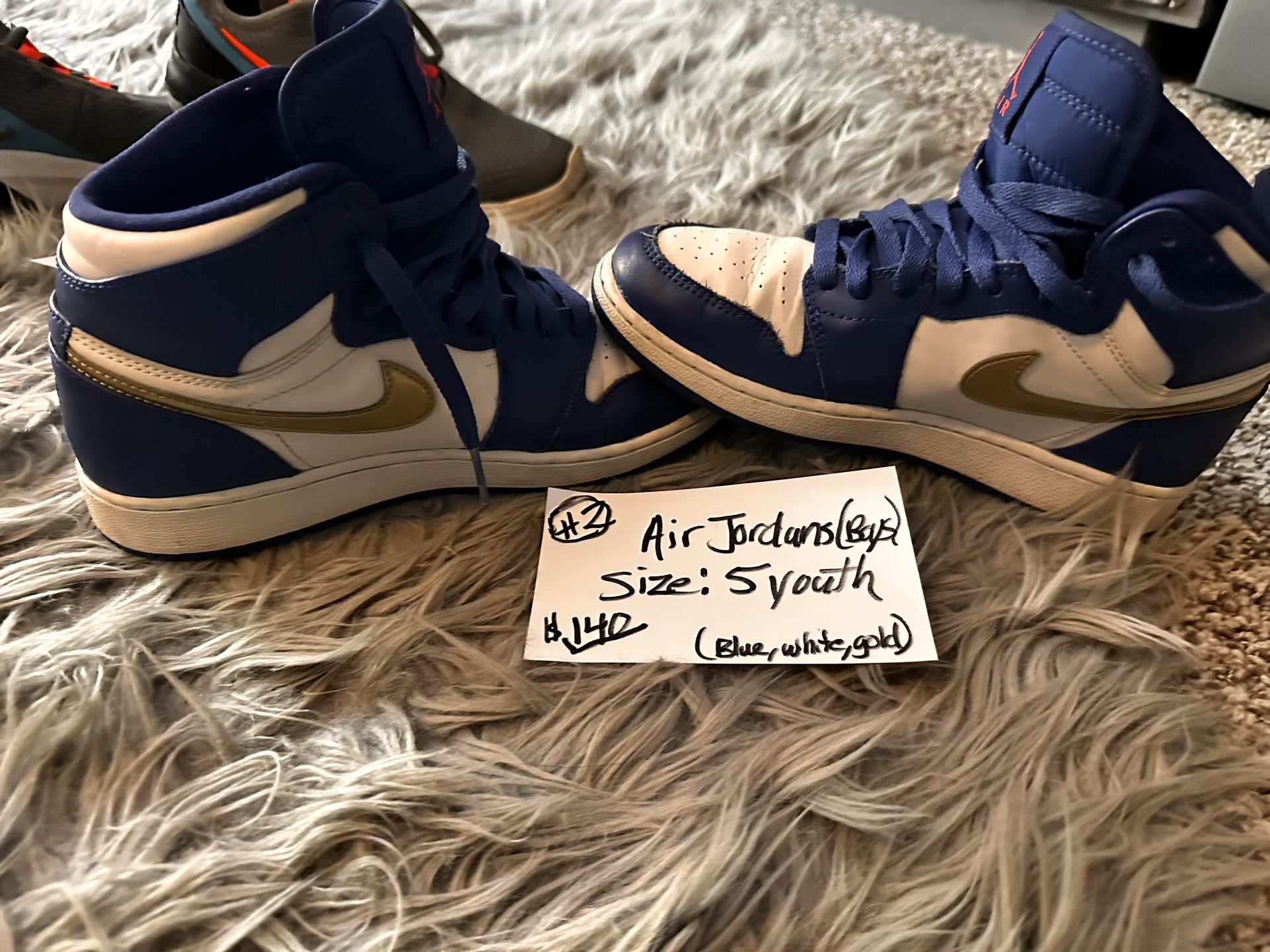 Air Jordan’s Flights Blue, White, and Gold Size 5 Youth