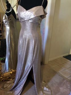 Women’s new with tags, never worn gold gown