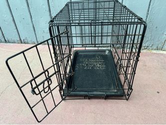 Small Cage For Pets In Good Condition  Dimensions Tall 15 Inches Wide 12 Inches deep 19 Inches