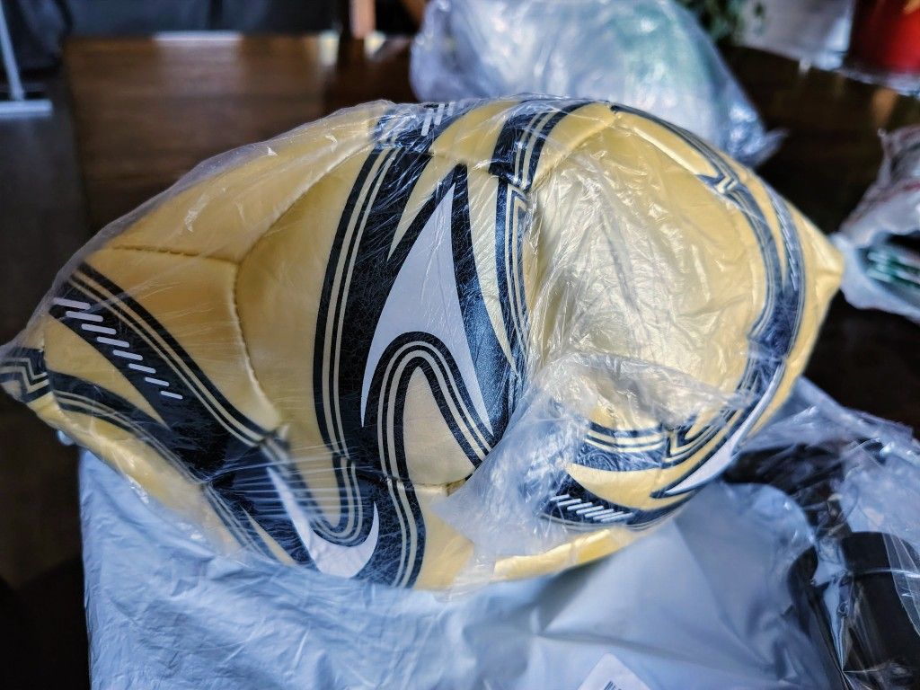 Brand New PEARL YELLOW Soccer Ball Size 4 WITH NEW HAND PUMP IN PLASTIC. SEE PHOTOS. CASH, PICTURE PICKUP ONLY