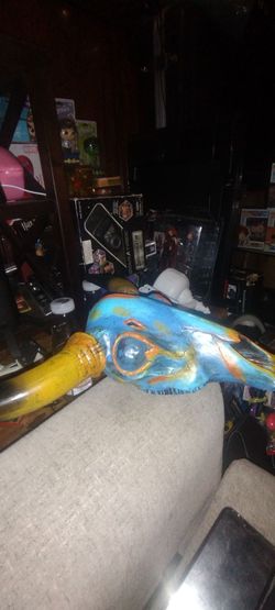 I have this very nice bull with two horns not sure the I think it's ceramic but it's very heavy and made very well not sure the texture might be would
