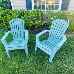 teal Adams Manufacturing RealComfort stackable resin Adirondack chair.