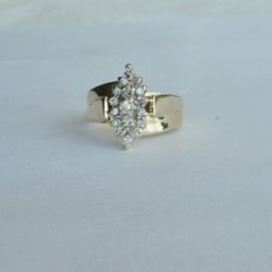 14k Marquise shaped diamond cluster ring. .65 ct