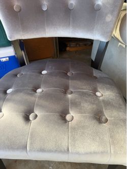Gray velvet chairs and ottoman