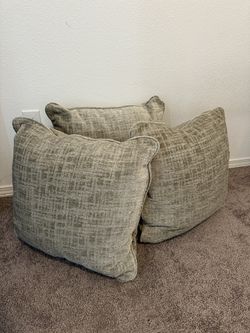 Three Large Beige Pillows