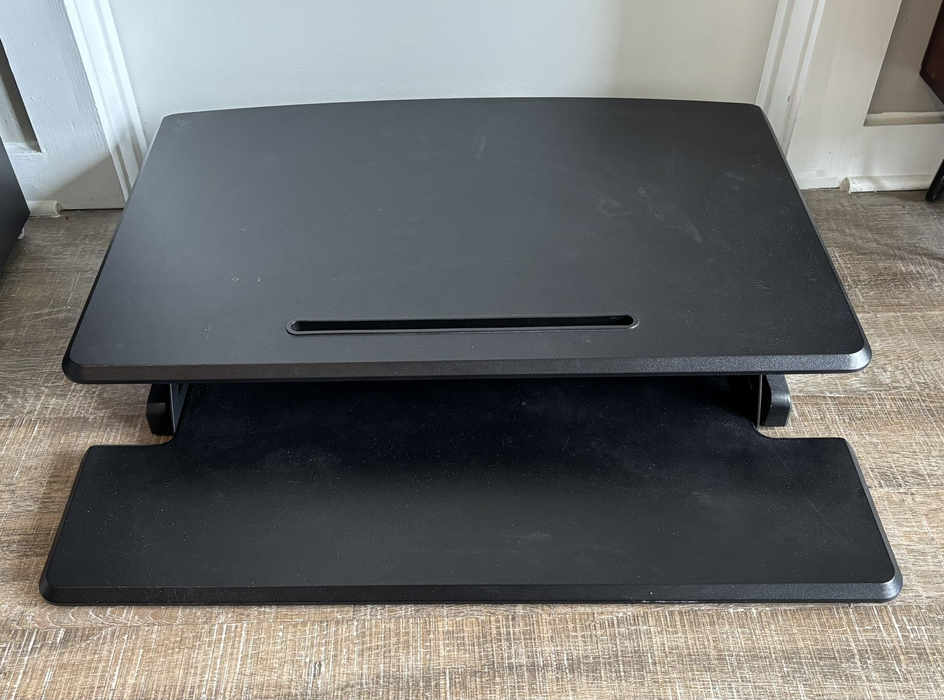 Desk riser / sit-stand converter