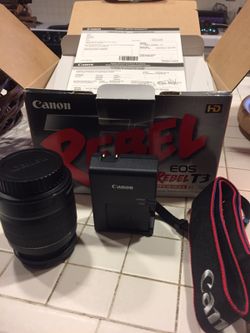 Rebel lens, strap and charger