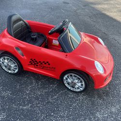 6V Kid’s Toddler Red Sports Car Convertible Electric Ride on Car! Car contains Two 6V Batteries for longer play time. Works great! New Batteries. Incl