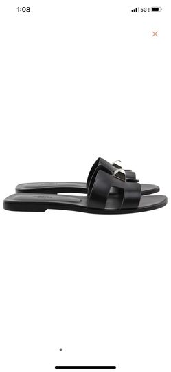 Hermes Oran Stud Sandals in black leather 