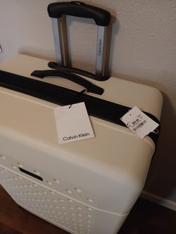 NEW!! XL Calvin Klein hardside luggage with tags