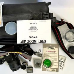 Nikon N6006 35mm SLR Film Camera (NOT Tested) with Sigma 28-70 lens & Nikon bag