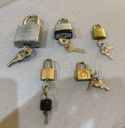 various sizes of padlocks with matching keys.