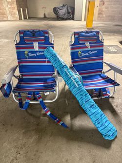 Two Tommy Bahama chairs and umbrella