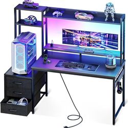 DK108 $50  48 Inch Gaming Desk with Hutch & 3 Fabric Drawers, Computer Desk with USB Ports & LED Lights, Reversible Pc Gamer Table with Monitor Stand 