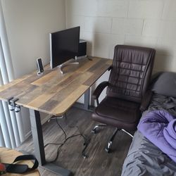 Desk/chair/monitor/ Speakers. 