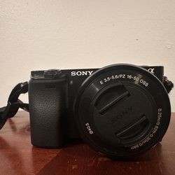 Like-New Sony α6000 Digital Camera Bundle (ILCE-6000L/B)