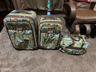 Kathy Van Zeeland rolling luggage set